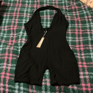 SKIMS Black soft lounge plunge halter onesie